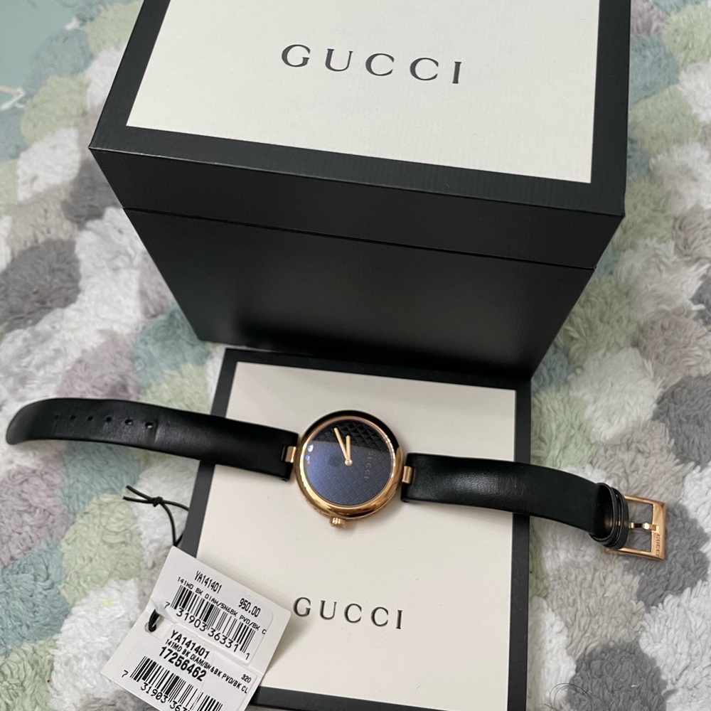 Gucci Rose gold and Black Watch